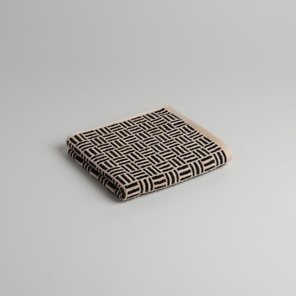 TORRENS HAND TOWEL
sand & noir
