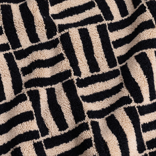 SAROMA BATH MAT
sand & noir